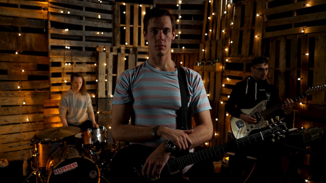 From left, Coleman, Justin, and Troy, together recording a music video